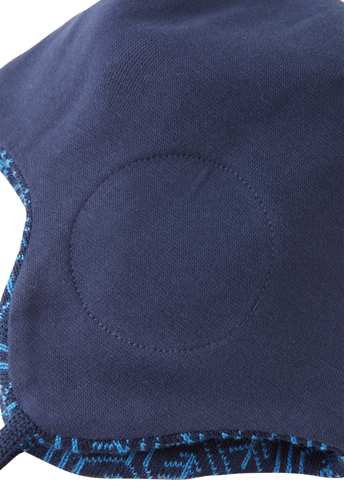 Reima Mütze mit Bändel <br>Kuurainen <br>Gr. 46, 48, 50, 52 <br>innen hautfreundliche Bio-Baumwolle<br> aussen warme, wasserabweisende Merino-Wolle<br> Windstopper-Membrane im Ohrbereich